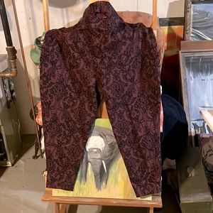 Torrid gently used size 5 leggings burgundy and black floral pattern